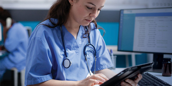 healthcare worker with tablet