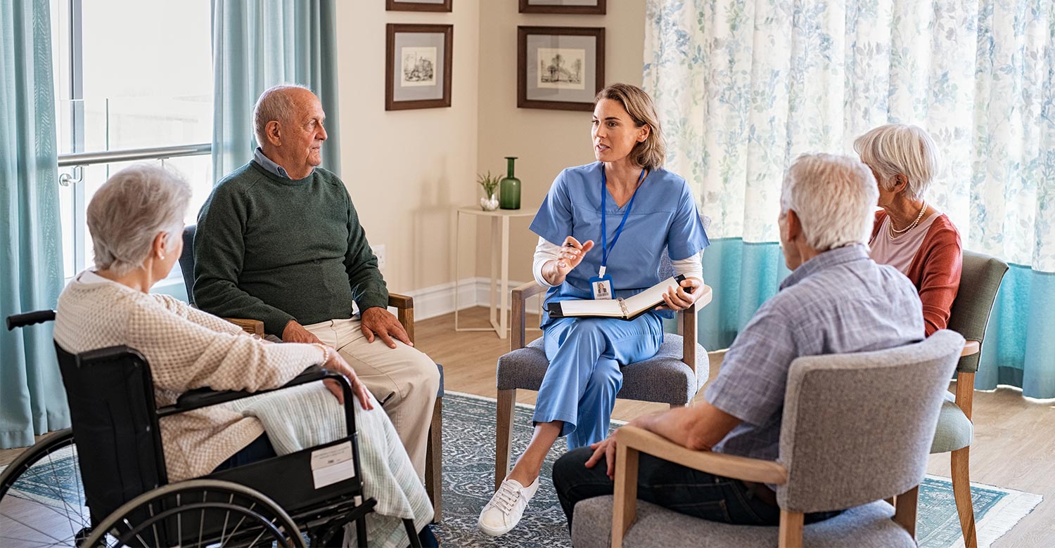 Doctor talking with a group of patients